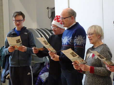 Christ Church choir at the Clay Farm Centre Christmas event. Photo: Andrew Roberts, 17 December 2022.