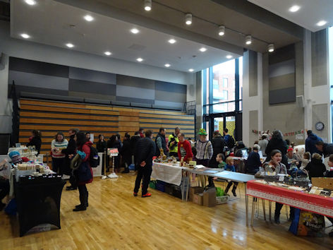 Stalls and craft tables at the Clay Farm Centre Christmas event. Photo: Andrew Roberts, 17 December 2022.