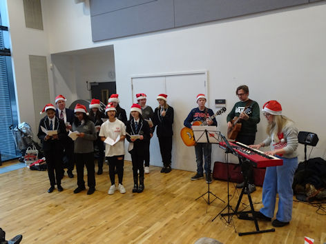 Trumpington Community College choir at the Clay Farm Centre Christmas event. Photo: Andrew Roberts, 17 December 2022.