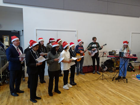 Trumpington Community College choir at the Clay Farm Centre Christmas event. Photo: Andrew Roberts, 17 December 2022.