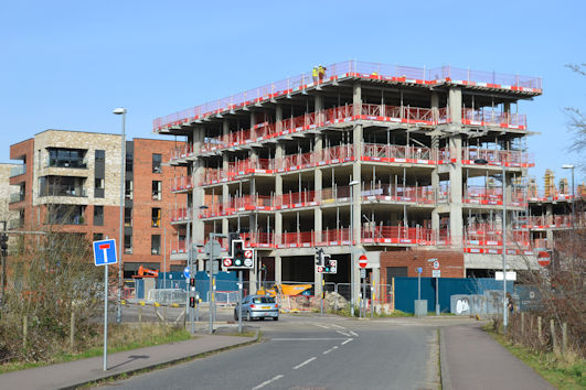 Progress with apartments and shops adjacent to Hobson Square, from Hobson Avenue. Photo: Andrew Roberts, 20 February 2021.
