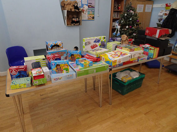 Gifts at the Christmas Food Hub. Photo: Andrew Roberts, 22 December 2023.