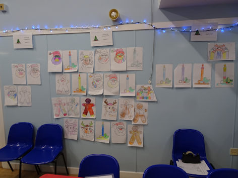 Entrants in the colouring competition at the Trumpington Pavilion Christmas Fair. Photo: Andrew Roberts, 4 December 2022.