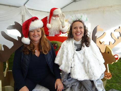 Trumpington Winter Fair, Trumpington Pavilion: Karen Lamb, Father Christmas and Amanda Nilsson. Photo: Andrew Roberts, 5 December 2021.