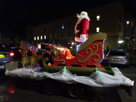 Father Christmas and sleigh arriving at the Trumpington Meadows Christmas event. Photo: Andrew Roberts, 11 December 2021.
